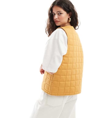 ASOS DESIGN quilted gilet in mustard