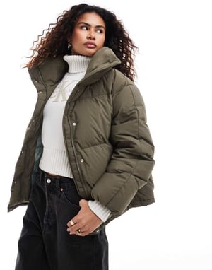 Calvin Klein Jeans avslappnad pufferjacka i brunt