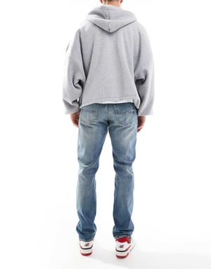 Tommy Jeans Ryan regular raka jeans i sliten mellanblå tvätt