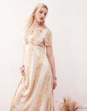 Återvunnen vintage midi-teaklänning i blommönster