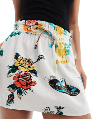 ASOS DESIGN linne-look knytmidja mini kjol i tropisk utskrift