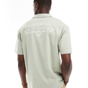 ASOS DESIGN oversized polo med ryggtryck i ljusgrön