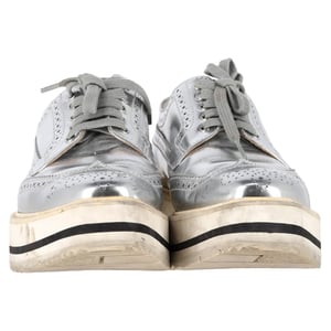 Prada Wingtip Oxford Platform Sneakers in Metallic Silver Leather