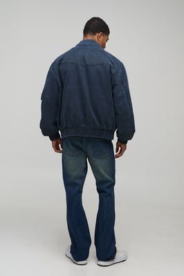 Stacked Flared Cross Rhinestone Embellished Denim Jeans