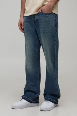 Straight Flared Washed Jeans With Let Down Hem