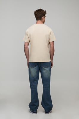 Straight Flared Washed Jeans With Let Down Hem