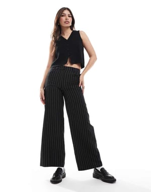 ASOS DESIGN knitted compact v neck waistcoat in black