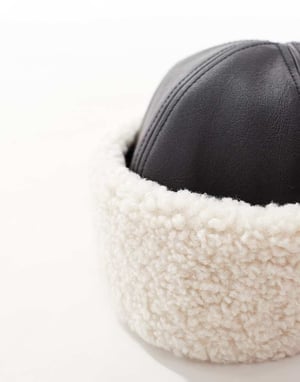Weekday faux leather hat with borg trim in black
