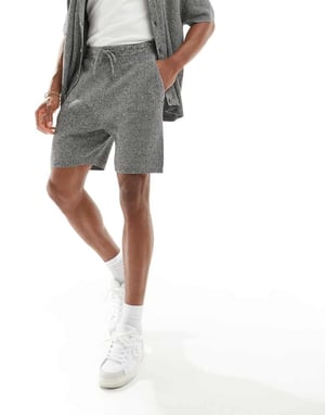 ASOS DESIGN koordinerade stickade shorts i svart vriden ribb