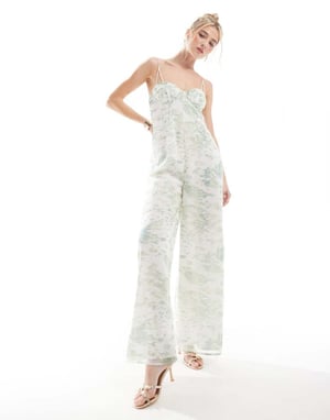 ASOS DESIGN råkantig korsettpanelad jumpsuit med utskärning i suddig djurmönster