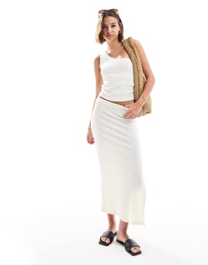 ASOS DESIGN stickad ribbad kolonn midi kjol i vitt