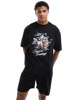 ASOS DESIGN pyjamapaket med jul-dinosaurie-slädförprint i svart
