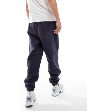 ASOS DESIGN premium tyngdtjock oversize joggers 400gsm i marinblå