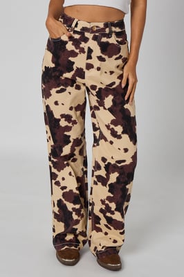 BROWN PATTERN COW PRINT JEANS