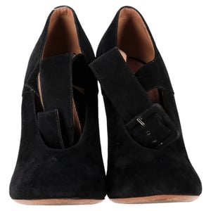 Alaïa Buckled Strap Pumps in Black Suede