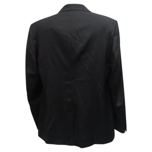 Meneer P., enkelvoudige blazer met zakken in zwarte wol.