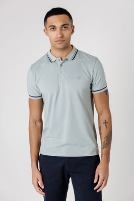 Light Green Textured Polo Shirt With Button-Up And Logo Badge