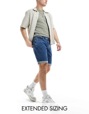 ASOS DESIGN stretch slim regular längd denimshorts i medelblå tvätt