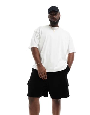 ASOS DESIGN oversized ribbad velourshorts i svart med cargofickor
