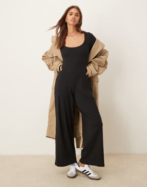 ASOS DESIGN ribbad långärmad kroppsnära jumpsuit i svart