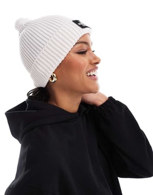 The North Face-logotypemärkt pompom-hatt i off-white