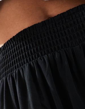 ASOS DESIGN Lång supermjukt slinkytights med vida ben i svart med kontrasterande kantband