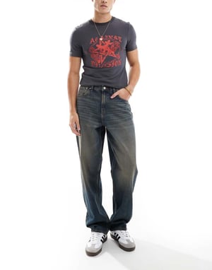 ASOS DESIGN baggy jeans med vintage-ton i medelblå tvätt