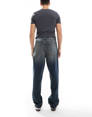 ASOS DESIGN baggy jeans med vintage-ton i medelblå tvätt