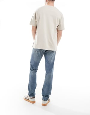Tommy Jeans Slim Tapered Jeans i Blå
