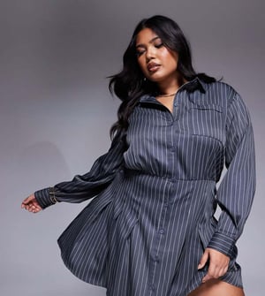 In The Style Plus x Natalya Wright exclusive tailored pleated mini shirt dress in charcoal pinstripe