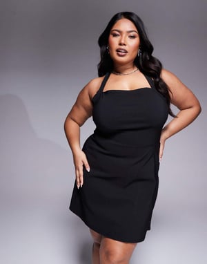 In The Style Plus x Natalya Wright exclusive tailored halterneck mini dress in black
