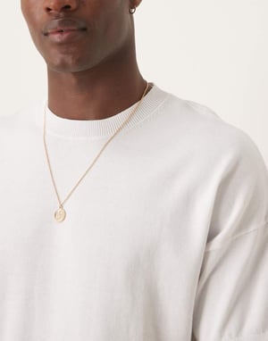 ASOS DESIGN relaxed midweight knitted cotton t-shirt in white