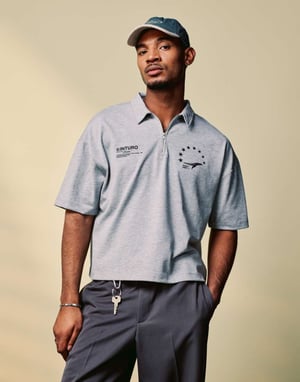 ASOS DESIGN boxy oversized zipped polo with sports graphic in grey marl rib