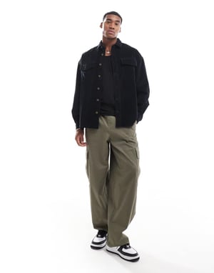 ASOS DESIGN 90s cord oversized shirt with patch pocket in black