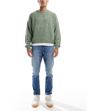 ASOS DESIGN stretch slim jeans in mid wash blue