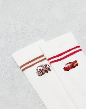 ASOS DESIGN Disney Pixar 2 pack socks with Mater and McQueen embroidery in white