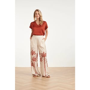 Smashed Lemon Wijde pantalon met abstracte palm print roest en zand |