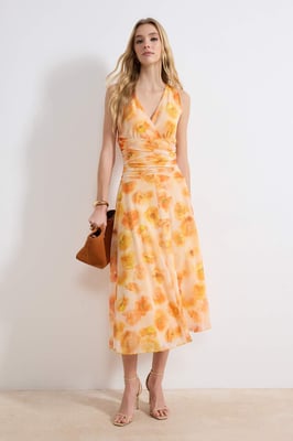 Mouwloze maxi-jurk met bloemenprint voor dames, geschikt voor overdag en 's avonds. Nauwsluitende bodycon-jurk.