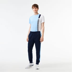 Men's Lacoste Vertical Logo Color Block Slim Cut Track Pants in Navy Blue