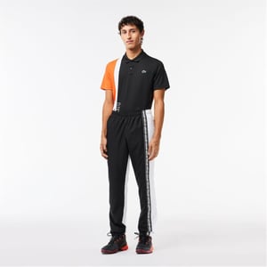 Men's Lacoste Color Block Slim Cut Track Pants in Black/White