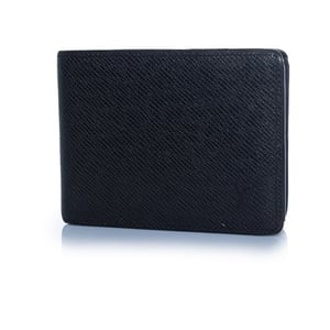Louis Vuitton portemonnee van zwart generfd leer met LV-logo.