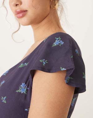 ASOS DESIGN v neck flutter sleeve midi tea dress in navy ditsy floral print
