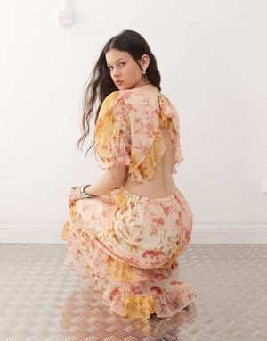 Reclaimed Vintage maxi dress with cutout detail in spliced floral print