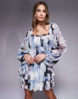ASOS DESIGN raw edge panelled mini dress with blouson sleeves in abstract print