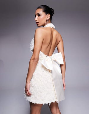ASOS LUXE textured halter mini dress with bow back in cream
