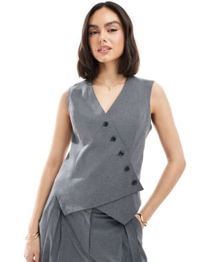 Vero Moda asymmetrisk väst i mörkgrå melange
