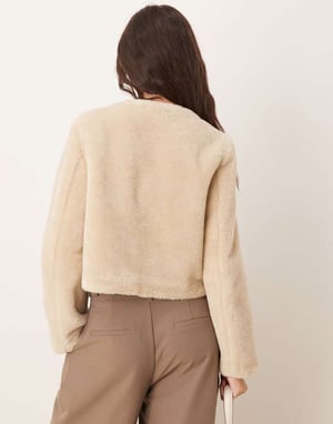 ASOS DESIGN collarless bonded borg jacket in cream