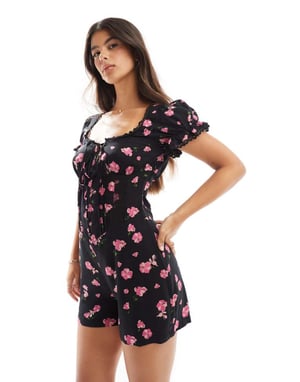 ASOS DESIGN snurrad spetskantad korsett midja jumpsuit i svart blommönster
