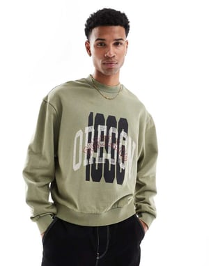 ASOS DESIGN boxy sweatshirt med syra-tvätt och lagerprint i grönt