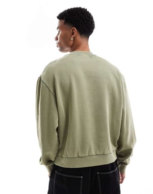 ASOS DESIGN boxy sweatshirt med syra-tvätt och lagerprint i grönt